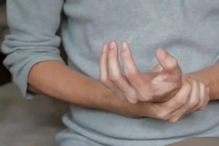 person with arthritic hands