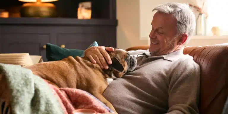 Man relaxing with dog